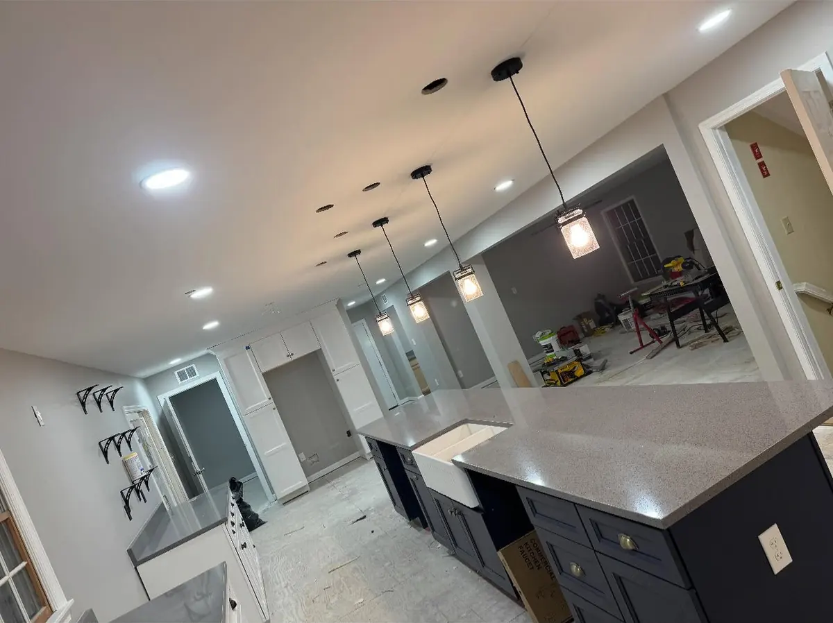 Pendant and recessed lighting in a renovated kitchen
